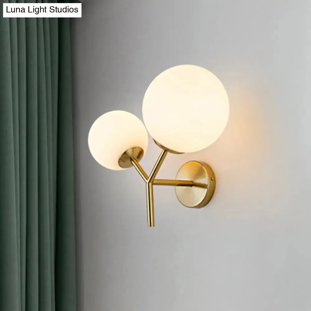 Contemporary White Glass Spherical Sconce with 2 Gold Heads - Wall Mounted Light Fixture