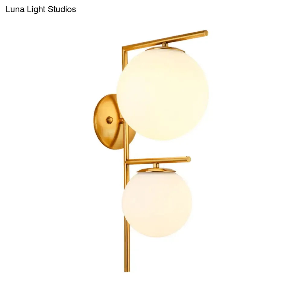 Contemporary White Glass Spherical Sconce with 2 Gold Heads - Wall Mounted Light Fixture