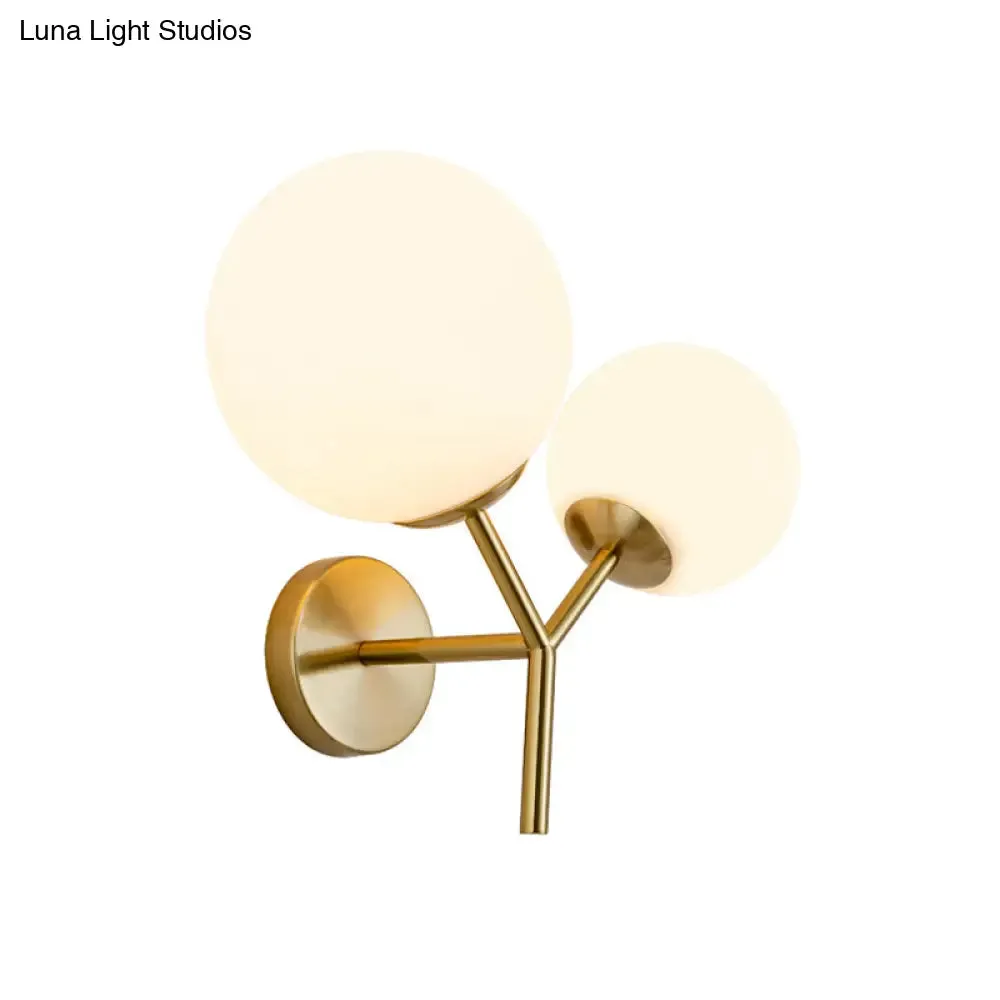 Contemporary White Glass Spherical Sconce with 2 Gold Heads - Wall Mounted Light Fixture